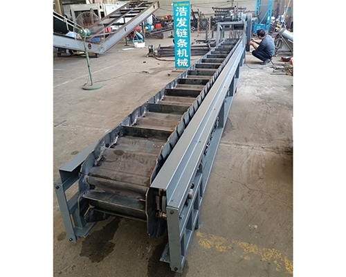 鱗板輸送機